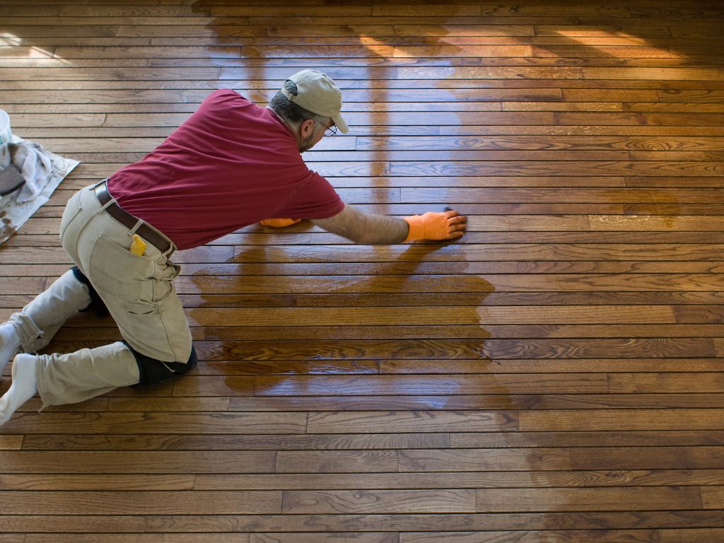 man floor refinishing